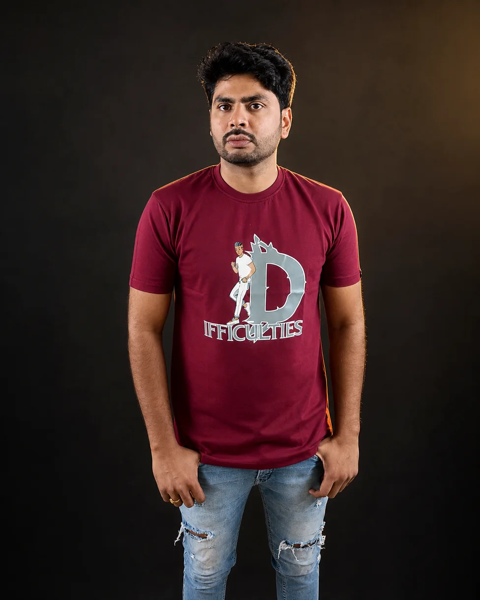 Model wearing the Ristair Difficulties maroon graphic T-shirt